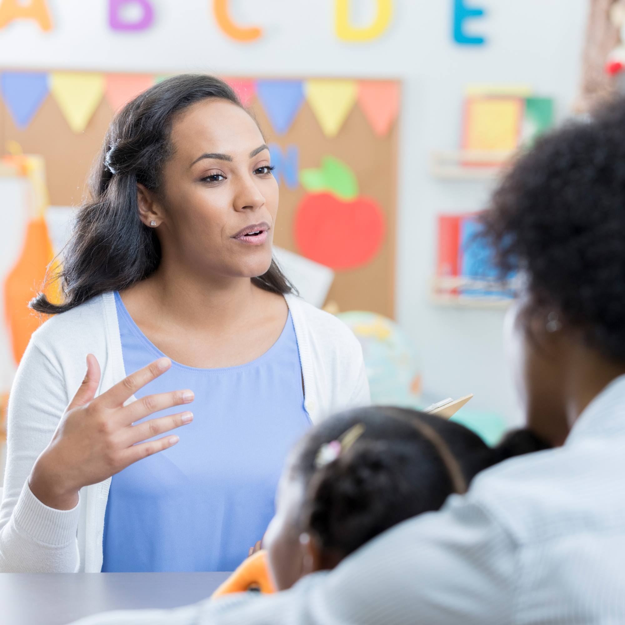 Parent communicating with staff